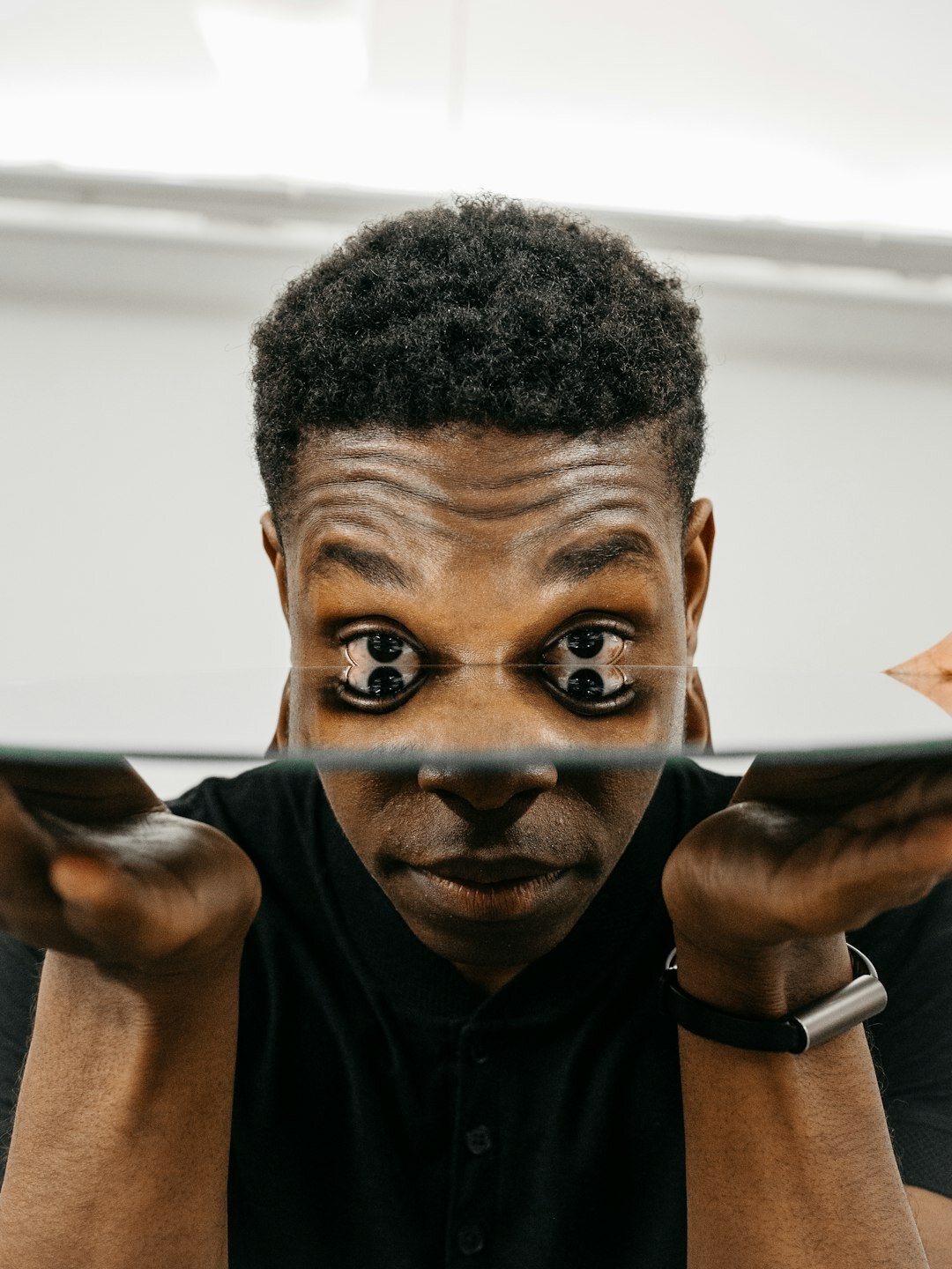 man practicing speech in mirror